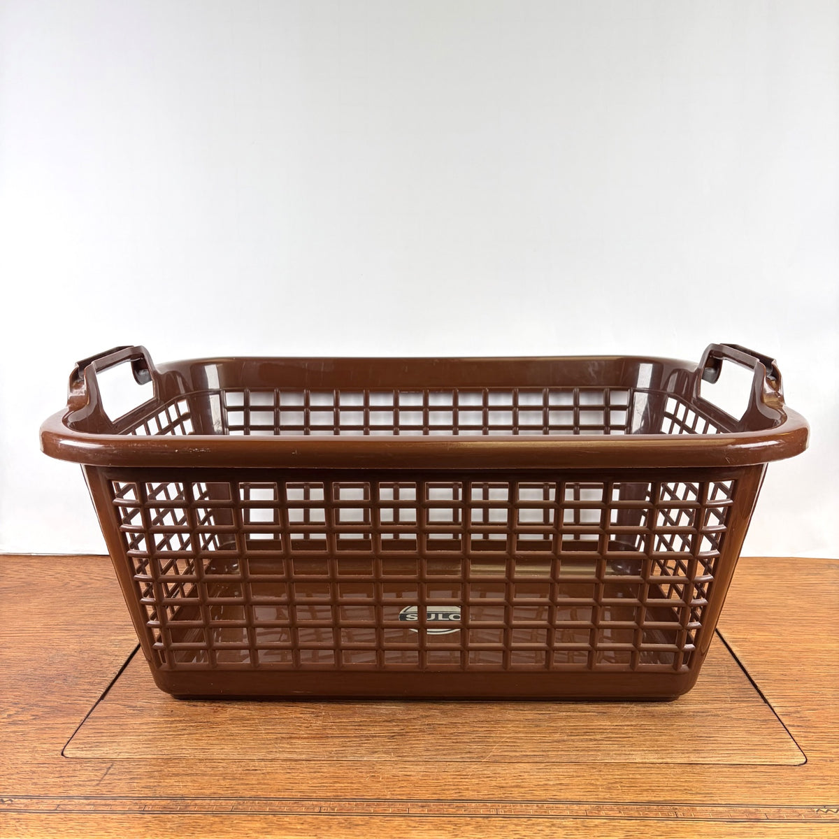 Vintage bruine plastic wasmand Sulo
