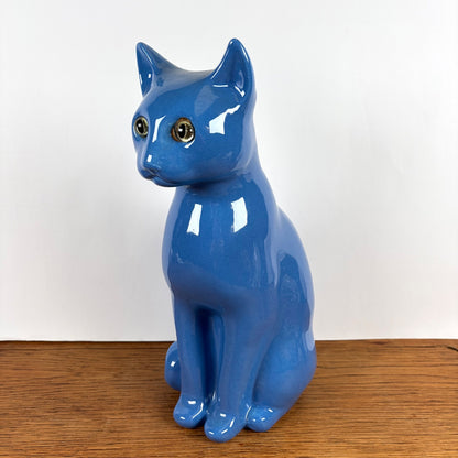 Vintage blauwe kat met groene ogen