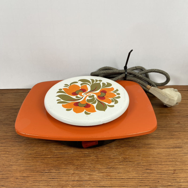 Vintage oranje warmhoud plaatje