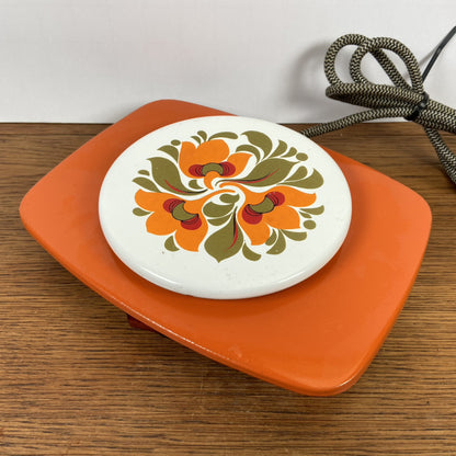 Vintage oranje warmhoud plaatje