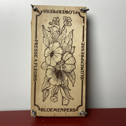 Vintage bloemenpers