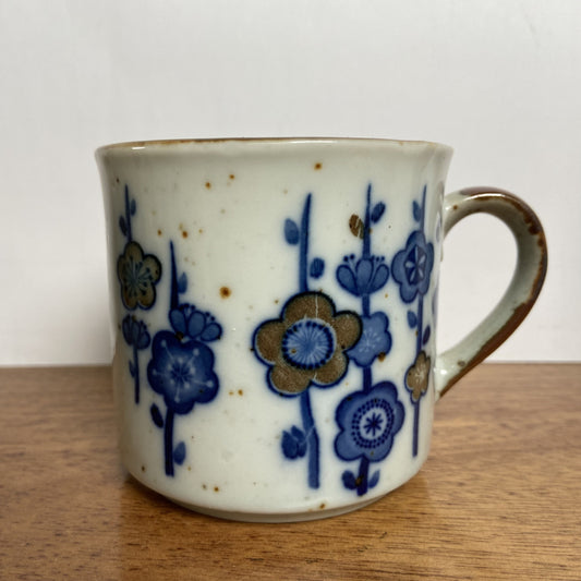 Vintage mokje blauwe bloemen