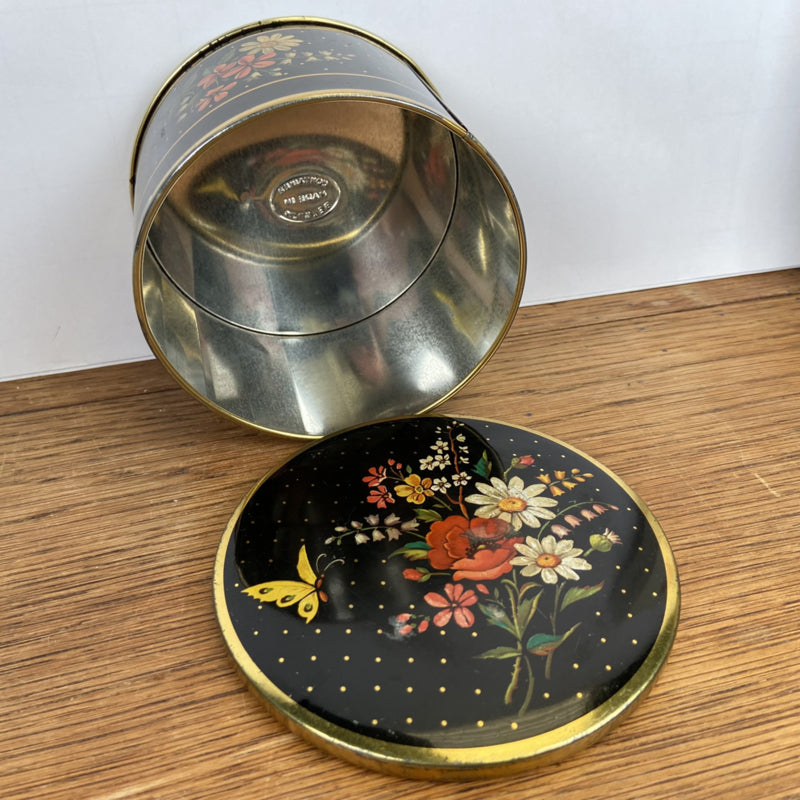 Vintage rond blikje met bloemen