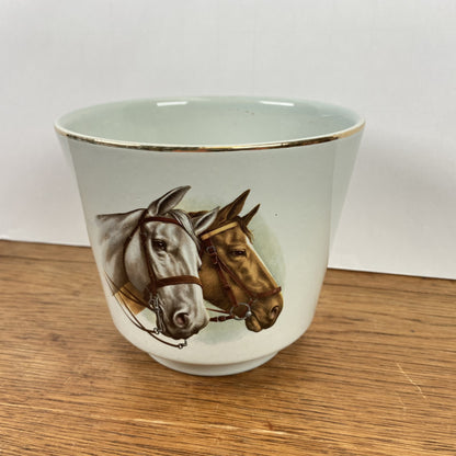 Vintage bloempot paarden